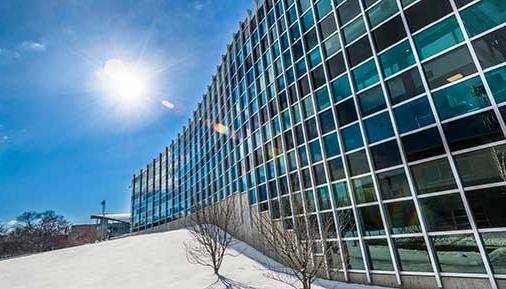 Exterior of Administration Building with snow on the ground